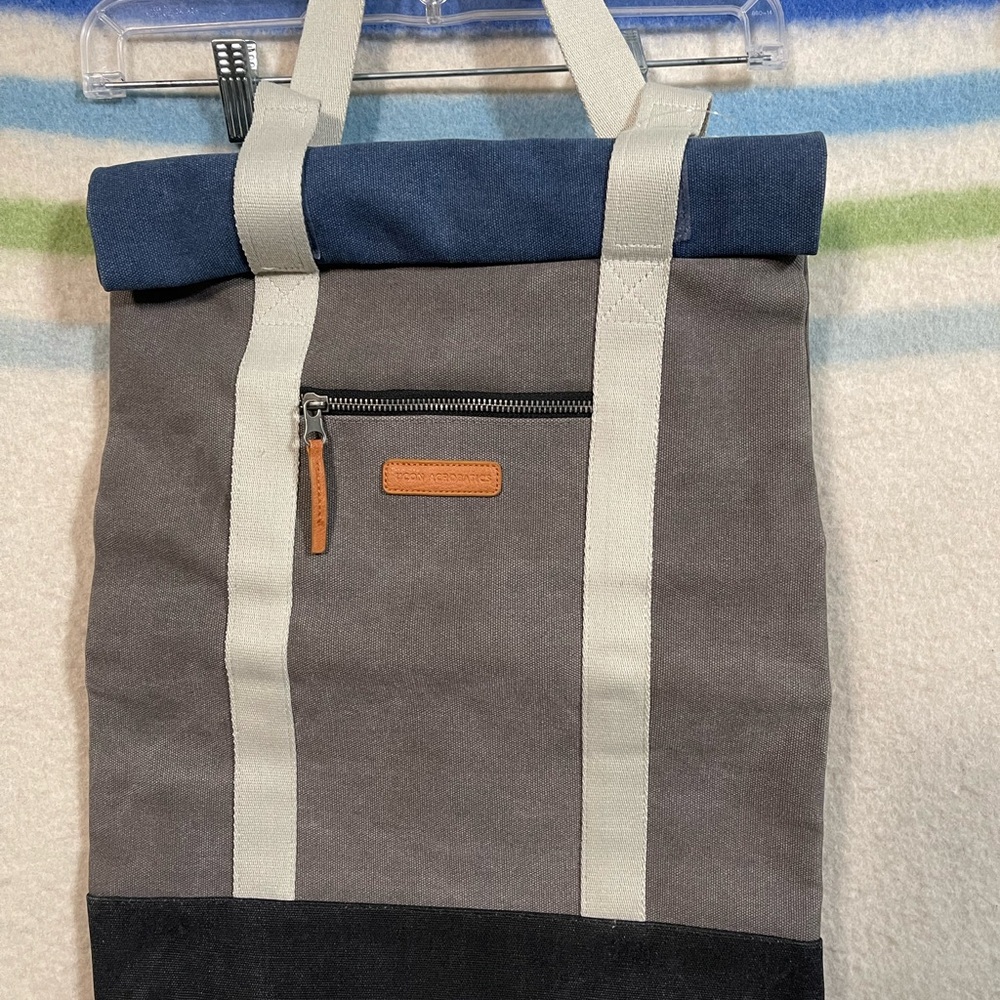 UCON Acrobatics Canvas Roll-Top Backpack with Blue Accent